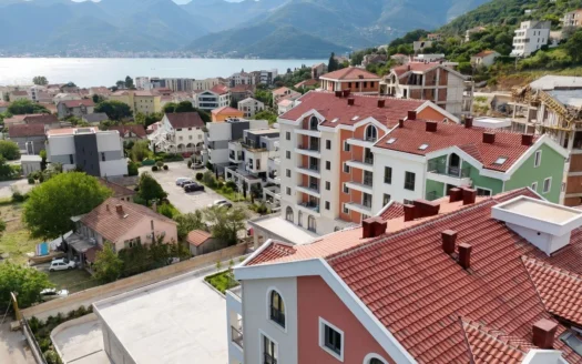One-bedroom apartment in a new residential and commercial development under construction – Donja Lastva, Tivat